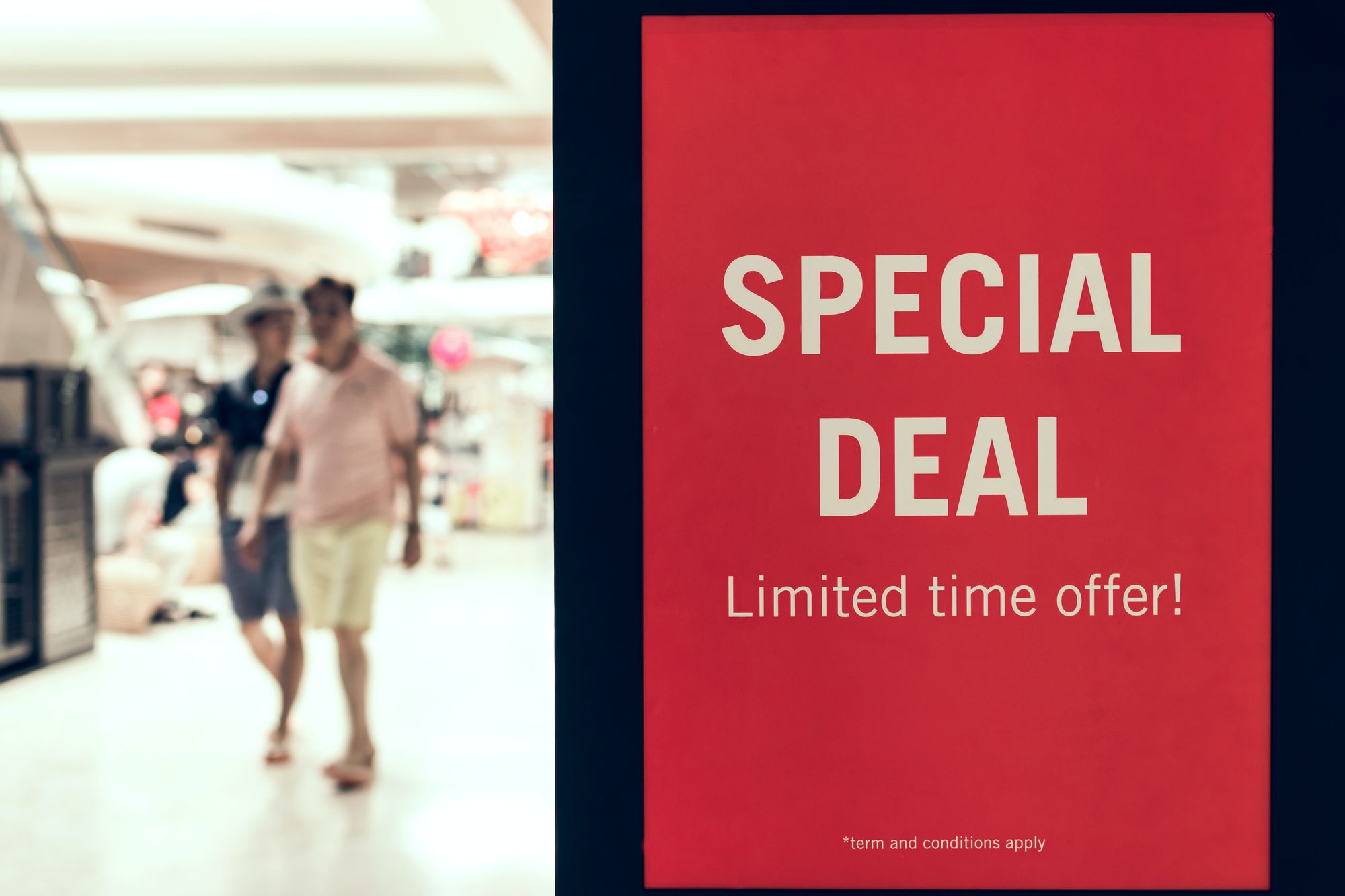the special deal announce on a shopping window with a fascinating red 