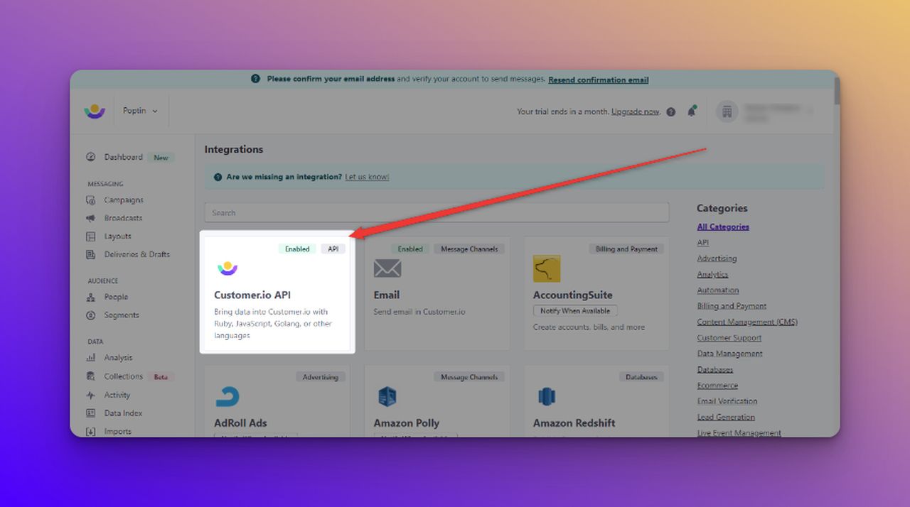 choosing Customer.io API for the Poptin integration on colorful background