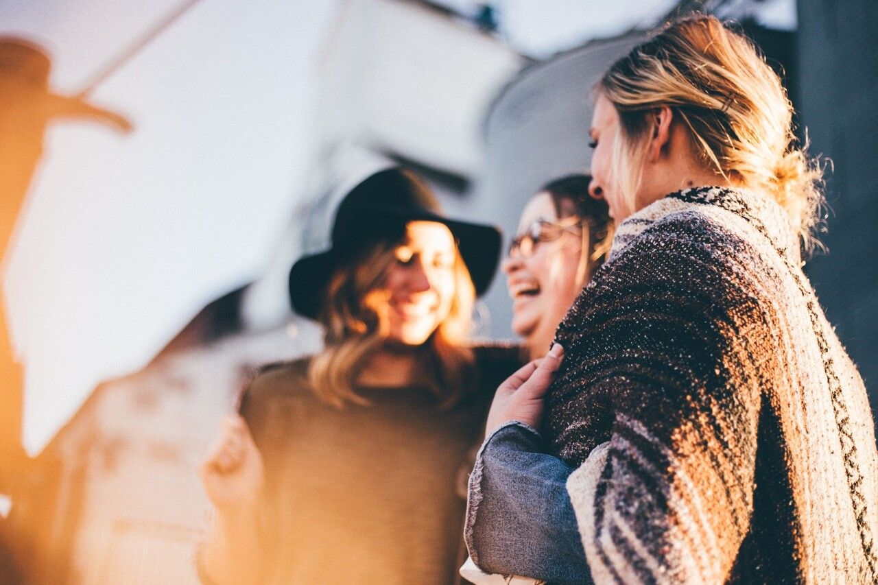 a group of people laughing from a view