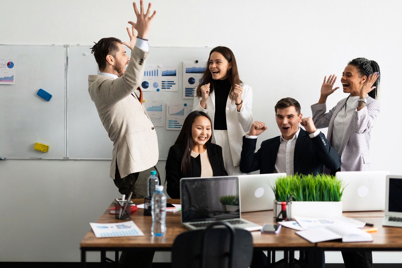 a group of colleagues in a meeting