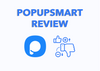 Popupsmart review feature image with the logo, thumbs-up & thumbs-down, plus & minus 